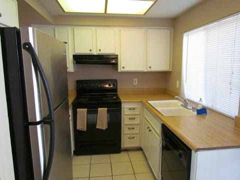 1 Bedroom, Townhouse | Private kitchen | Fridge