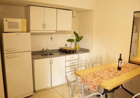 Family Apartment, 2 Bedrooms | Private kitchen | Fridge, microwave, stovetop, coffee/tea maker