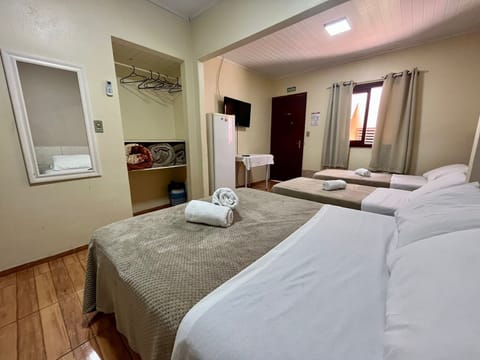 Quadruple Room | Minibar, blackout drapes, iron/ironing board, free WiFi