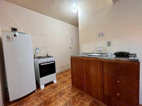 Double Room, Kitchen | Minibar, blackout drapes, iron/ironing board, free WiFi