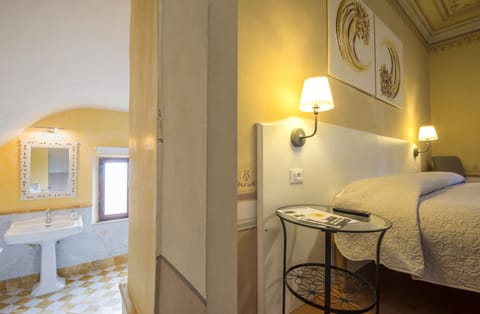 Deluxe Double Room, Jetted Tub | Bathroom | Hair dryer, towels, soap, shampoo