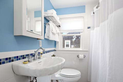 Room, 1 King Bed, Kitchenette | Bathroom | Combined shower/tub, eco-friendly toiletries, hair dryer, towels