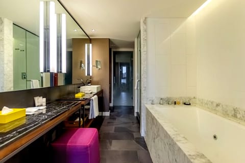 Suite, 1 King Bed (Hyatt) | Bathroom | Designer toiletries, hair dryer, bathrobes, slippers