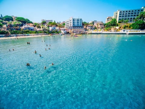 On the beach, sun loungers, beach umbrellas, beach towels