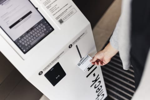 Check-in/check-out kiosk