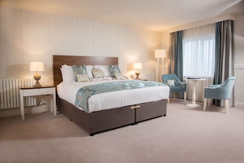 Honeymoon Suite, 1 King Bed | In-room safe, desk, iron/ironing board, rollaway beds