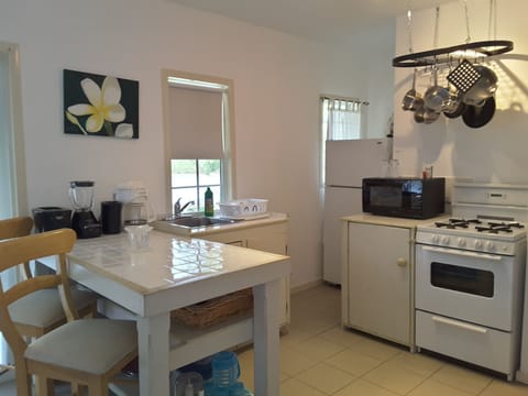 Cottage, 1 Bedroom | Private kitchen | Full-size fridge, microwave, stovetop, coffee/tea maker