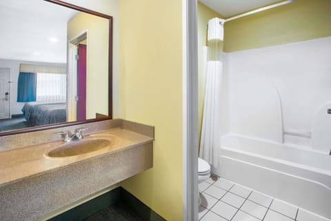 Combined shower/tub, deep soaking tub, free toiletries, hair dryer