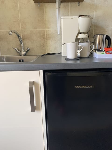 Classic Double Room (Beaumaris) | Private kitchen | Fridge, coffee/tea maker, electric kettle