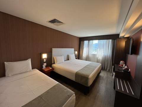 Family Room | Minibar, desk, iron/ironing board, free WiFi