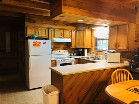 Spencer Cabin, 3 Bedrooms, Hot Tub | Private kitchen | Full-size fridge, microwave, oven, stovetop