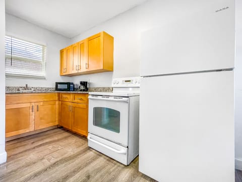 Apartment | Private kitchen | Full-size fridge, microwave, coffee/tea maker, toaster