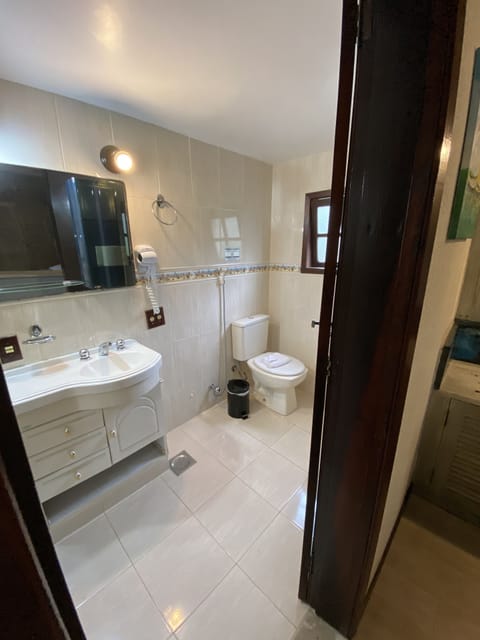 Quadruple Room | Minibar, in-room safe, blackout drapes, iron/ironing board