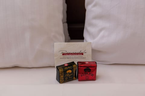 Premium bedding, down comforters, minibar, in-room safe