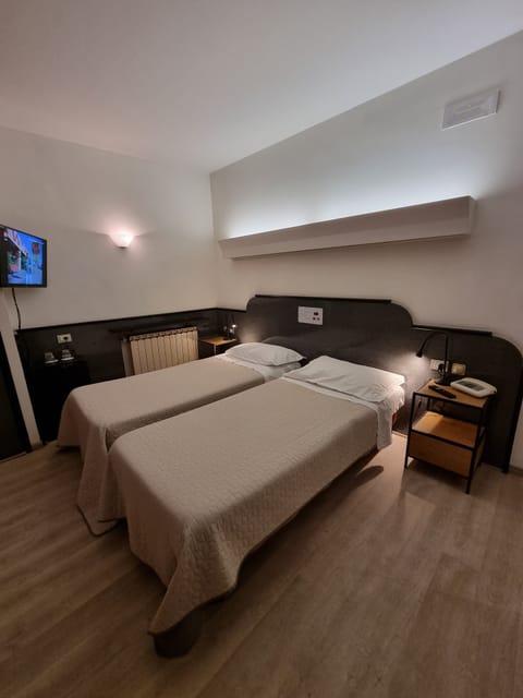Standard Double or Twin Room | Minibar, in-room safe, individually furnished, desk