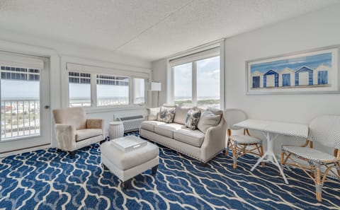 Oceanfront Suite | Living area | Flat-screen TV