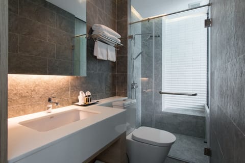 Pool Access Deluxe | Bathroom | Rainfall showerhead, free toiletries, hair dryer, bathrobes