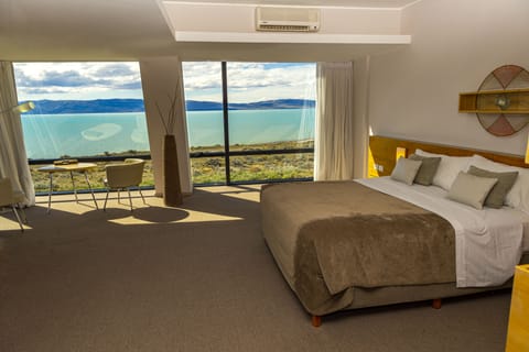 Suite, Lake View | Premium bedding, down comforters, minibar, in-room safe