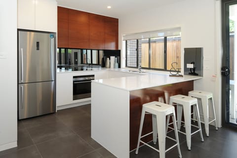 Lewis House | Private kitchen | Full-size fridge, microwave, oven, stovetop