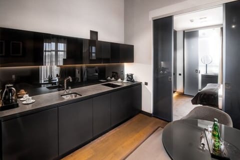 Penthouse | Private kitchenette | Mini-fridge, stovetop, coffee/tea maker, electric kettle