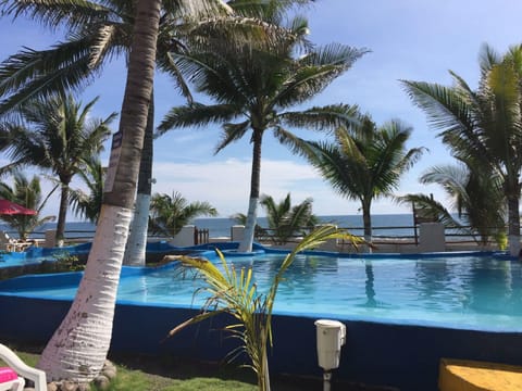 Outdoor pool, open 8:00 AM to 10:00 PM, sun loungers