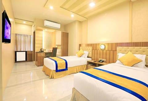 Deluxe Twin Room, 2 Twin Beds | 1 bedroom, premium bedding, minibar, in-room safe