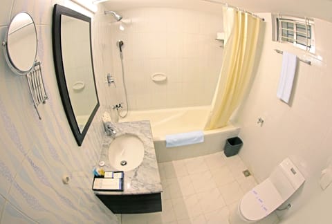 Business Suite, 1 King Bed, Smoking, 2 Bathrooms | Bathroom | Free toiletries, hair dryer, slippers, towels