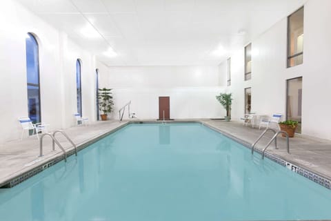 Indoor pool, open 9:00 AM to 9:00 PM, sun loungers