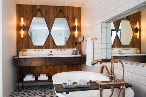 Suite (Thompson) | Bathroom | Designer toiletries, hair dryer, bathrobes, slippers