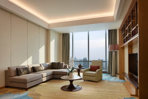 Club Suite, 1 King Bed | Living room | 55-inch LED TV with premium channels, TV