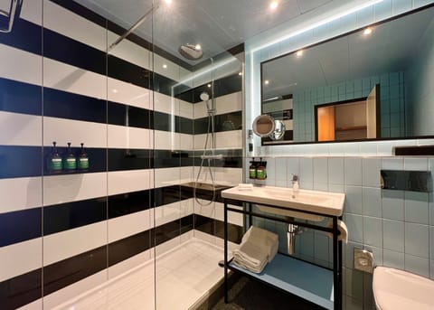 Hair dryer, towels, soap, shampoo