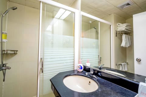 Triple Room | Bathroom | Shower, slippers, towels