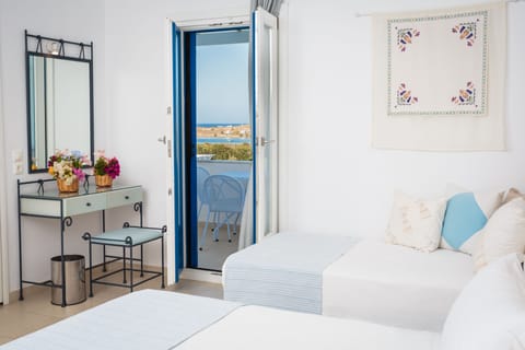 Triple Room, Sea View | In-room safe, individually decorated, desk, soundproofing