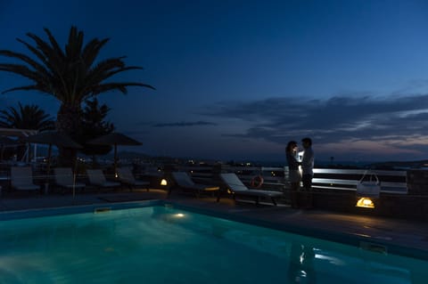 Seasonal outdoor pool, pool umbrellas, sun loungers