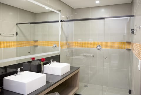 Shower, eco-friendly toiletries, hair dryer, towels