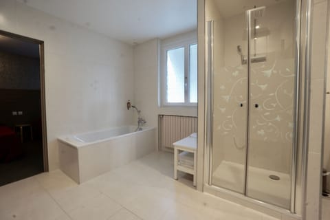 Family Room | Bathroom | Free toiletries, hair dryer, slippers, soap