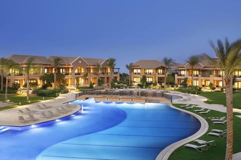 Indoor pool, outdoor pool, pool umbrellas, sun loungers