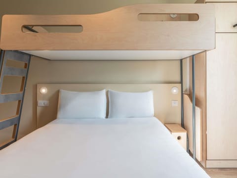 Desk, blackout drapes, soundproofing, free WiFi