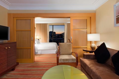 Junior Suite, 1 King Bed, City View, Poolside | Down comforters, pillowtop beds, minibar, in-room safe