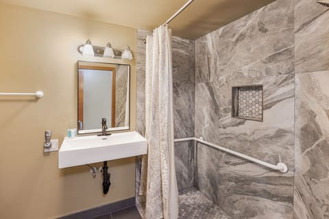 Room 6 with King Bed | Bathroom | Shower, hair dryer, bathrobes, towels