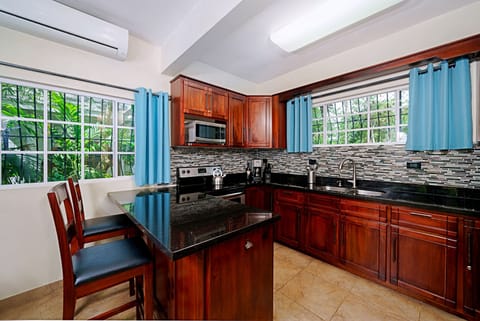 Garden House Apartment III | Private kitchen | Full-size fridge, microwave, oven, stovetop