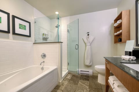 Separate tub and shower, deep soaking tub, designer toiletries