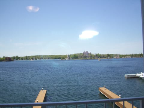 Panoramic Room, 1 King Bed, Balcony, St. Lawrence River View | Iron/ironing board, free WiFi, bed sheets