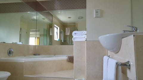 One Bedroom Spa | Bathroom | Designer toiletries, hair dryer, towels