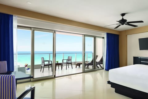 Suite, 1 King Bed, Oceanfront | Free minibar, in-room safe, blackout drapes, iron/ironing board