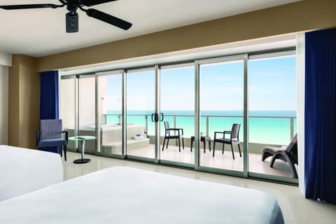 Suite, 2 Double Beds, Oceanfront | Free minibar, in-room safe, blackout drapes, iron/ironing board