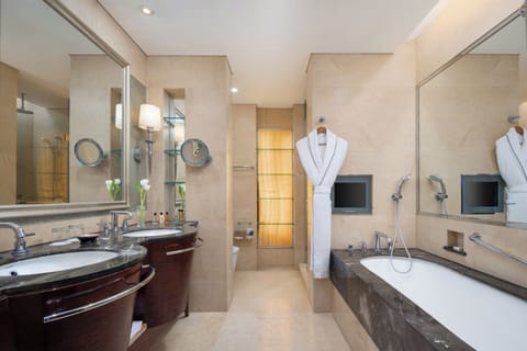 Executive Suite, 1 King Bed | Bathroom | Separate tub and shower, rainfall showerhead, free toiletries