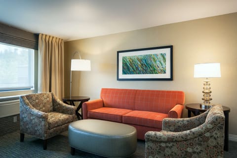 Suite, Accessible | Living area | 32-inch flat-screen TV with cable channels, TV, DVD player