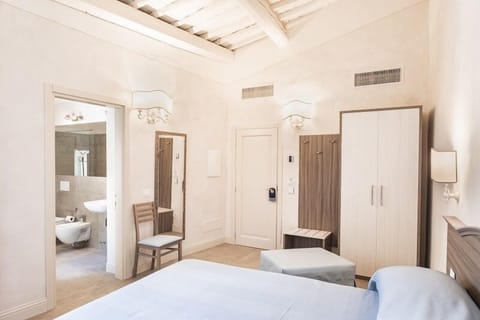 Family Room, 1 Bedroom, Pool Access | Minibar, desk, iron/ironing board, free WiFi