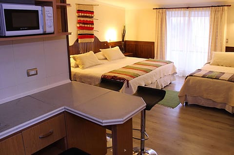 Standard Triple Room | Minibar, in-room safe, desk, free WiFi